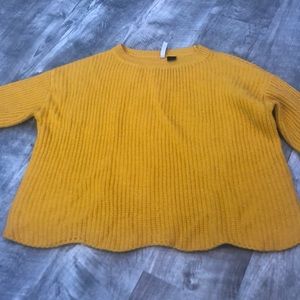 yellow sweater